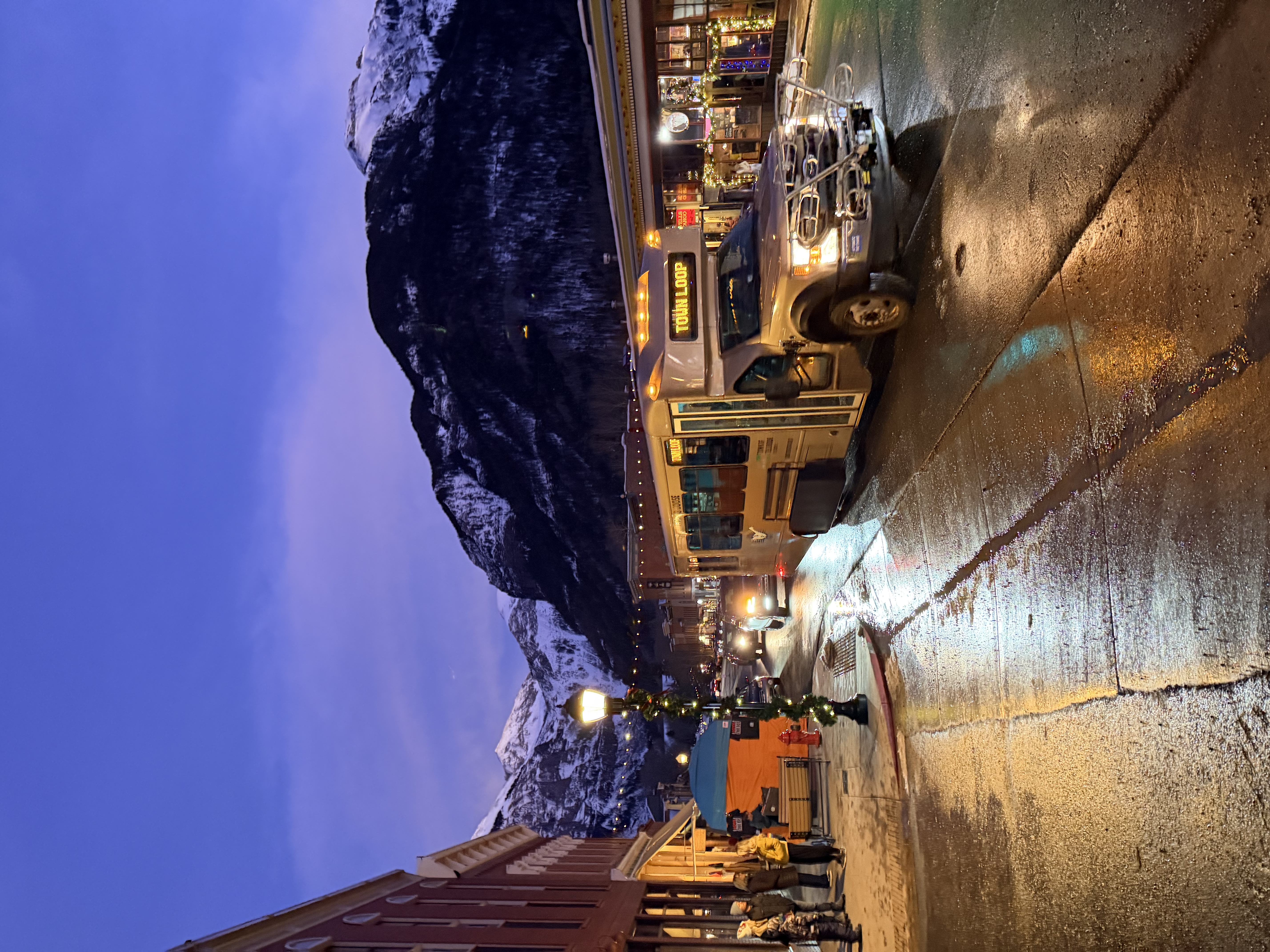 Downtown Telluride at dusk with mountain backdrop